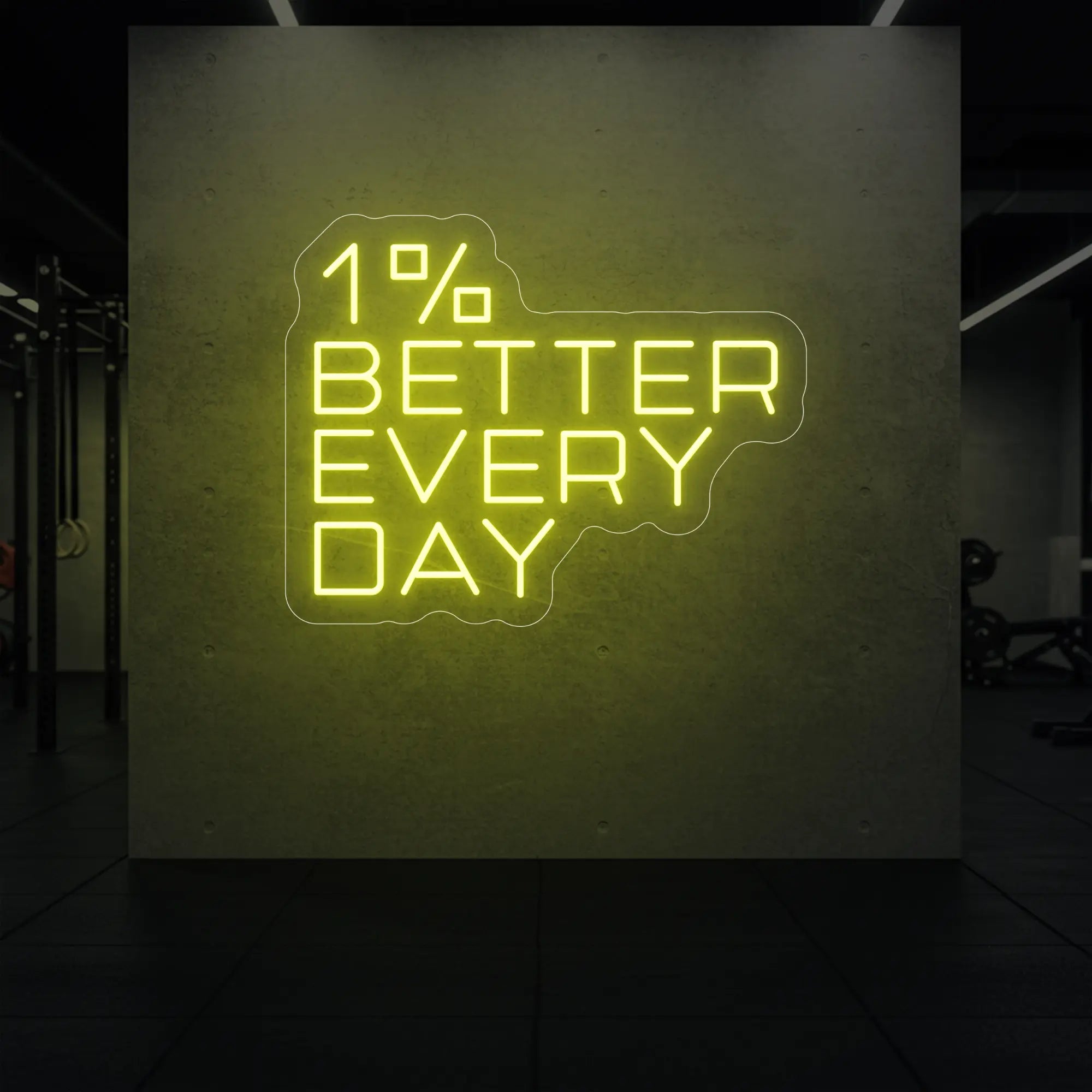 '1% Better Every Day' neon sign glowing in lemon yellow against a styled interior wall.