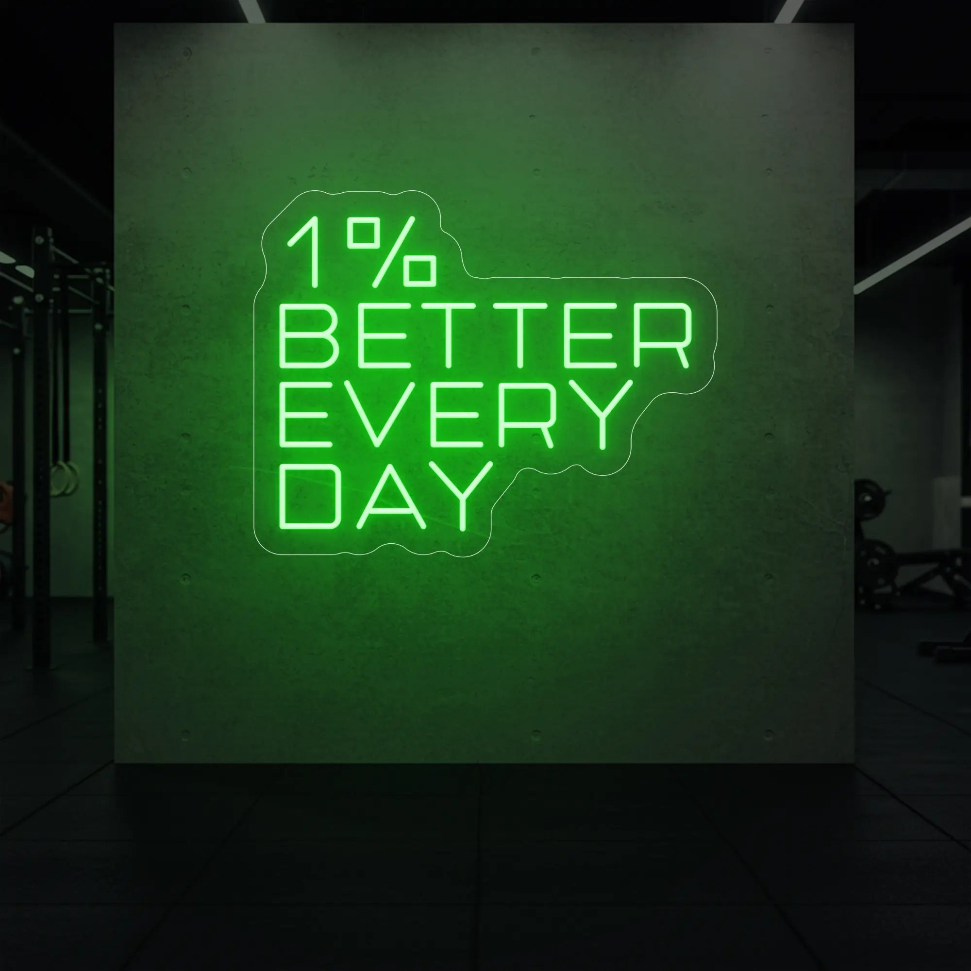 '1% Better Every Day' neon sign glowing in green against a styled interior wall.