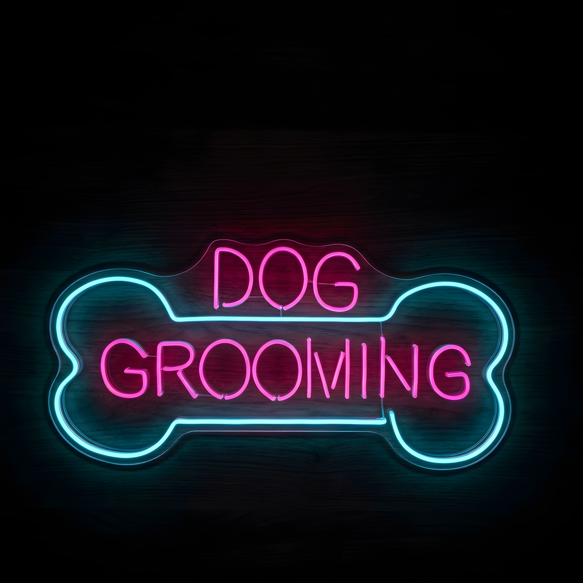 Dog Grooming Bone LED Neon Sign featuring bright pink DOG GROOMING lettering inside a glowing blue bone outline on clear acrylic backing against a dark wood wall.