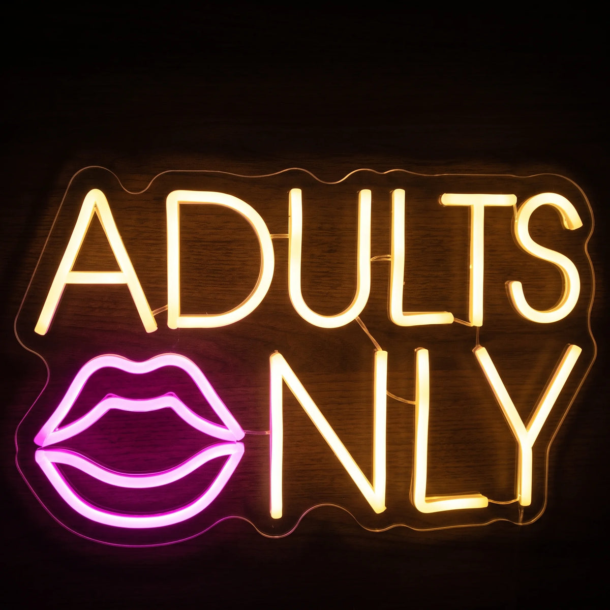 Adults Only LED neon sign featuring warm golden-yellow ADULTS ONLY lettering with a bright pink lips design.