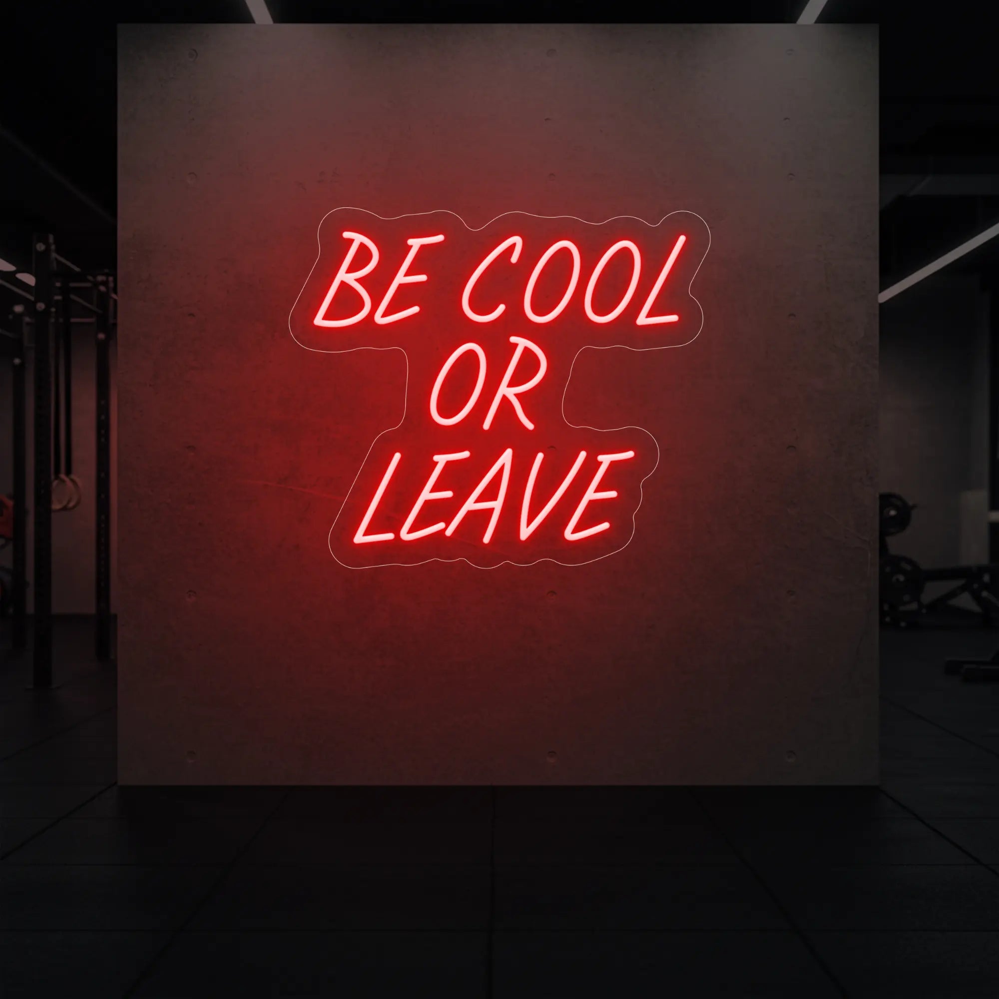 'Be Cool or Leave' neon sign glowing in red against a styled interior wall.