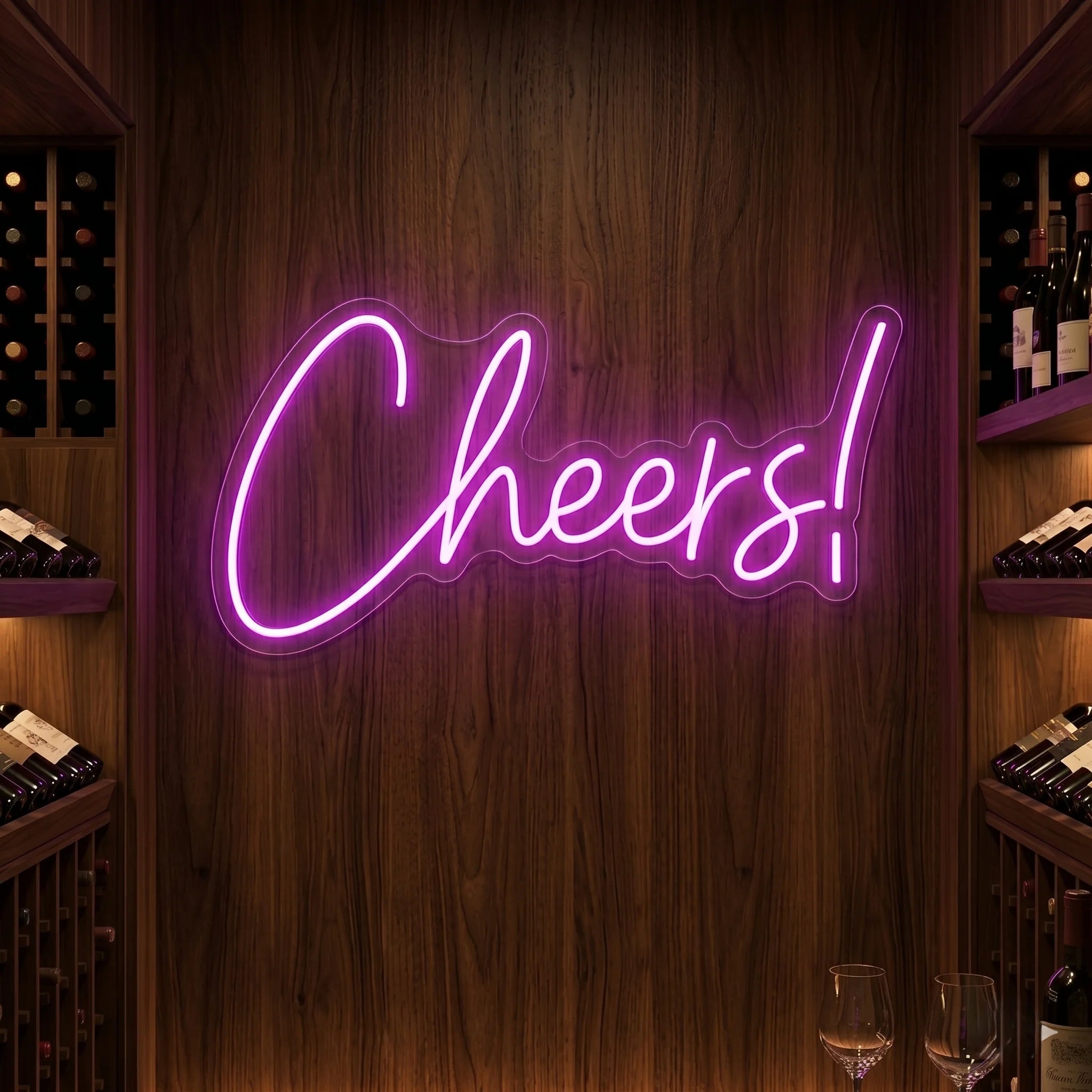 Photo of the 'CHEERS!' neon sign glowing in deep pink against a styled interior wall.
