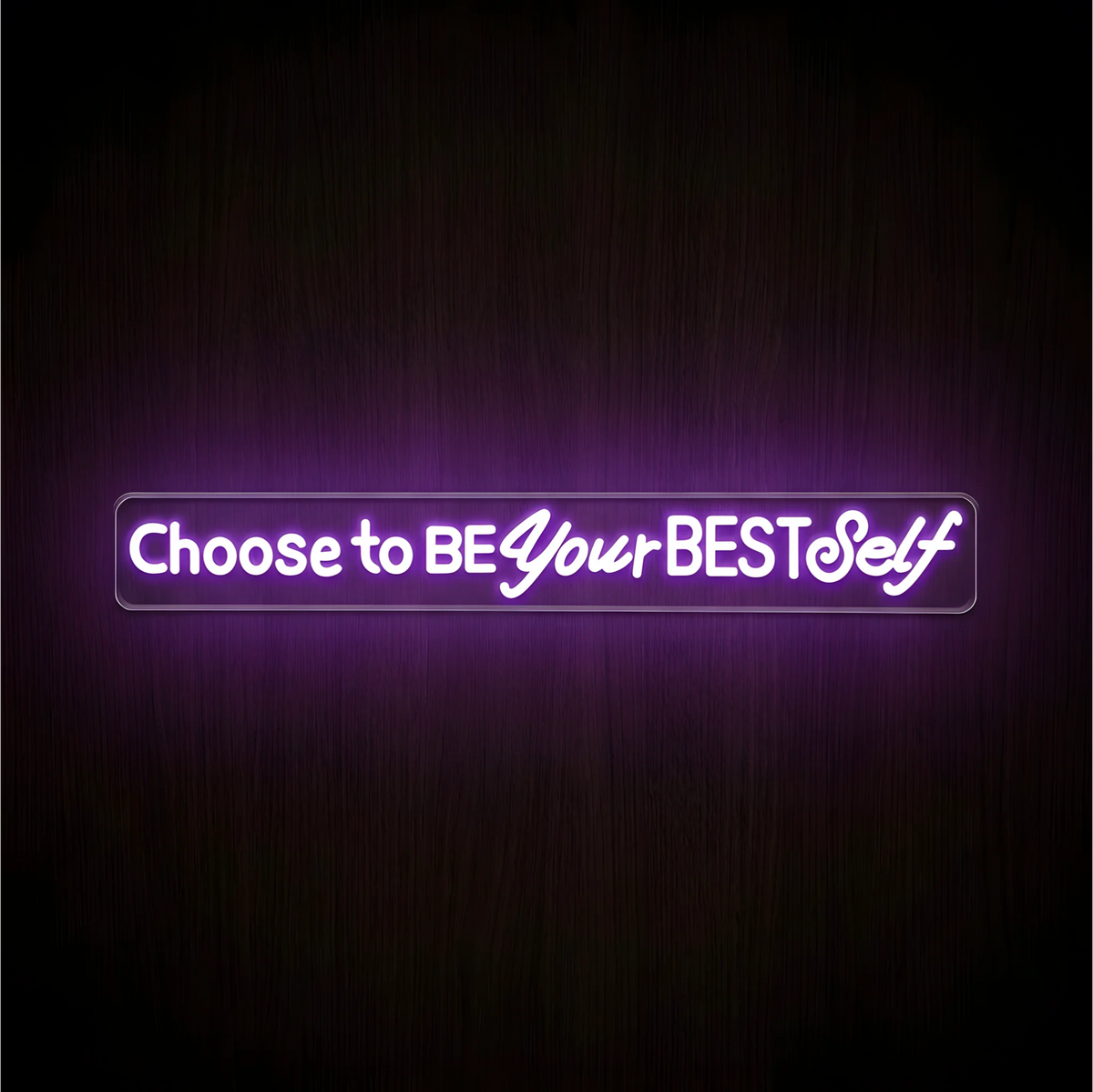 “Choose to BE Your BEST Self” LED Neon Sign with glowing purple and white lettering on clear acrylic backing against a dark wood background, suited to bedroom and home office decor.