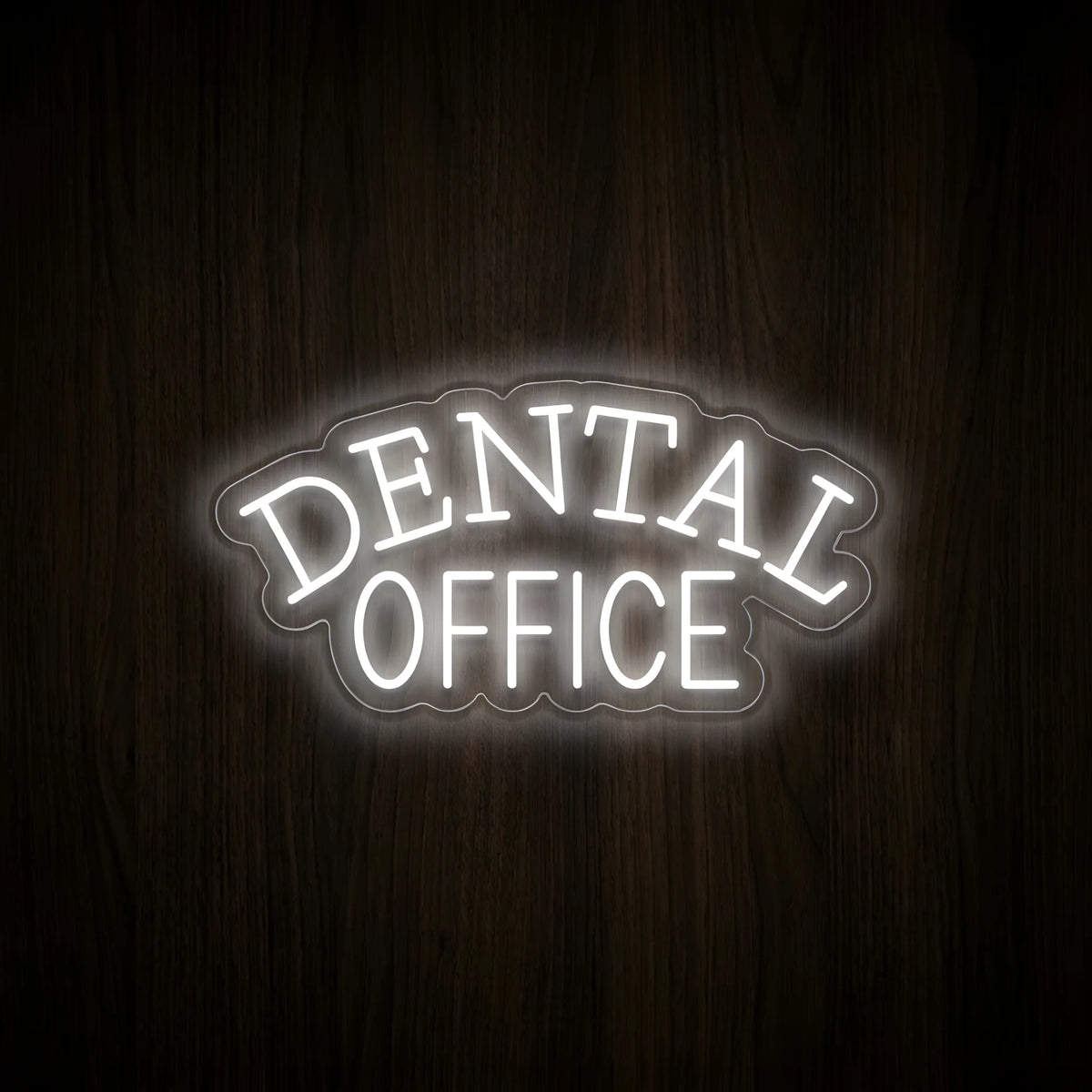 Classic Dental Office LED neon sign featuring cool white arched DENTAL lettering above OFFICE text on precision-cut clear acrylic backing, displayed on a dark wooden wall for dentist office decor.