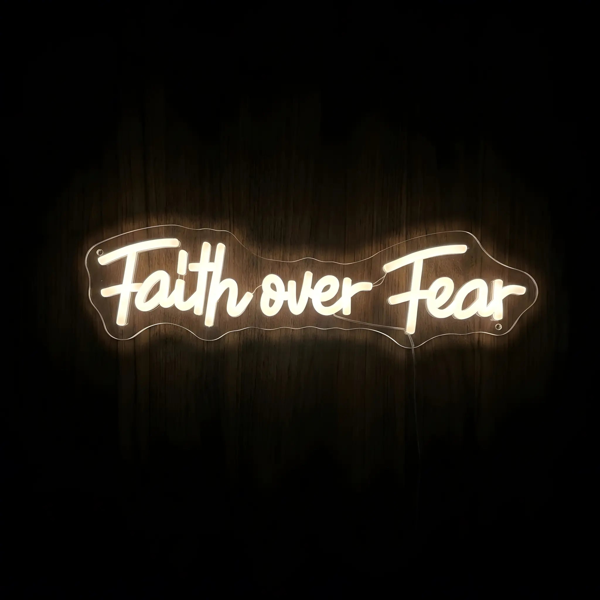 Faith Over Fear LED neon sign with warm white illumination on precision-cut acrylic backing, Christian wall decor featuring an inspirational faith message.