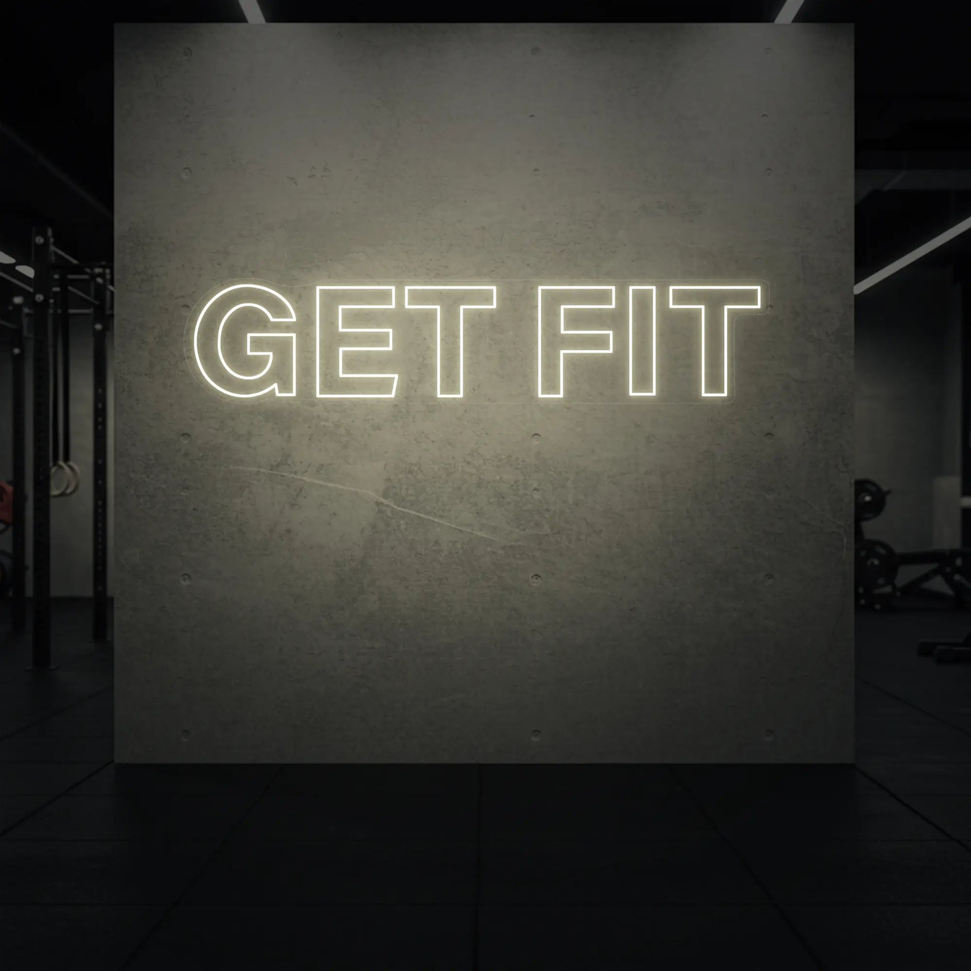 'Get Fit' neon sign glowing in warm white against a styled interior wall.