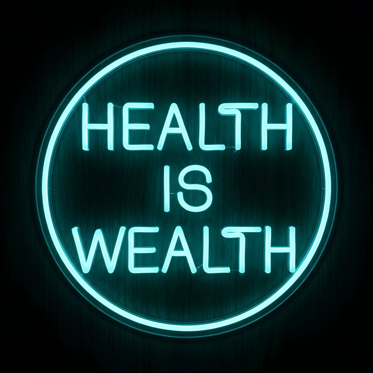Health Is Wealth Circle LED Neon Sign featuring glowing turquoise-blue lettering inside a circular neon outline on clear acrylic backing against a dark wooden wall.