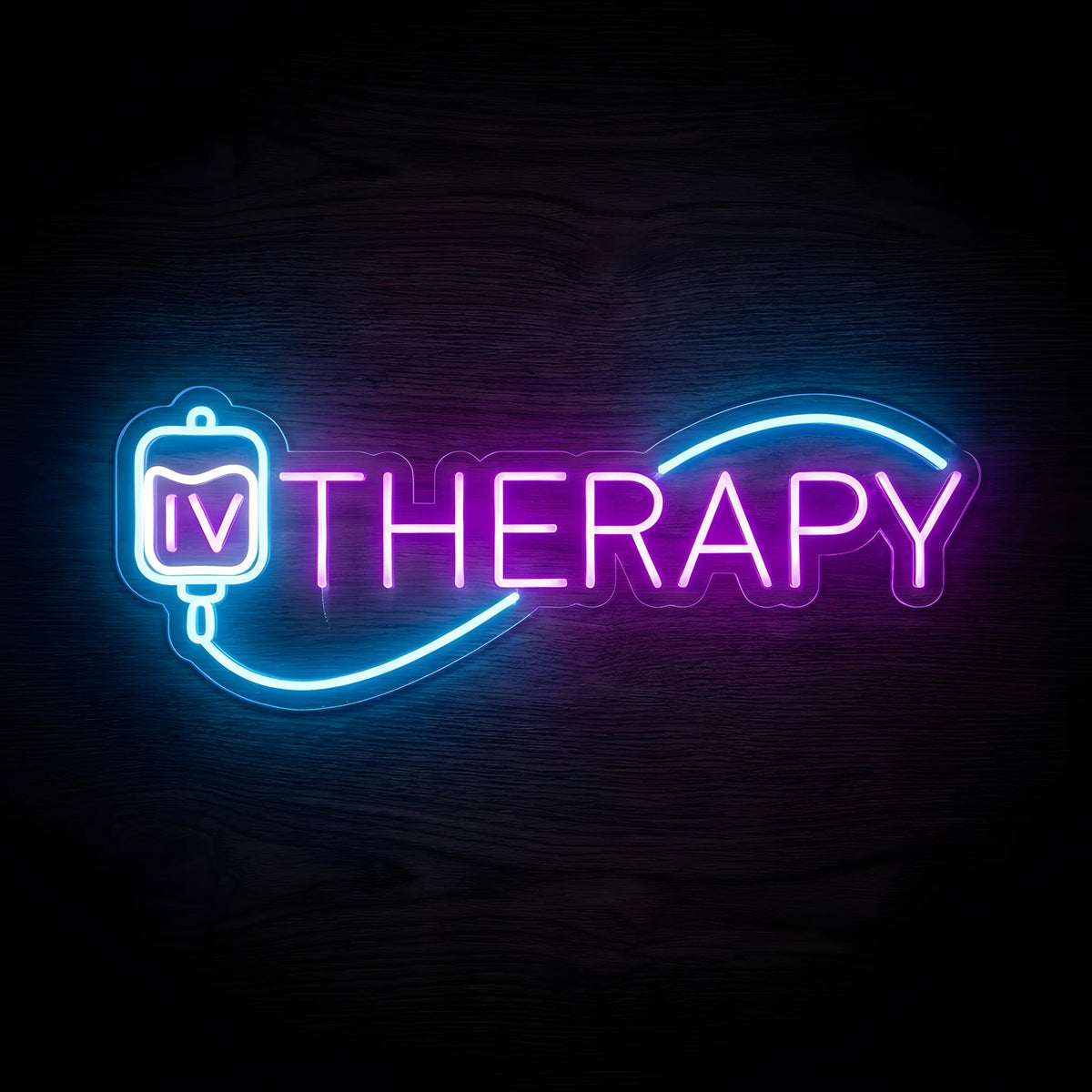 IV Therapy LED Neon Sign featuring glowing pink-purple THERAPY lettering, a blue IV drip bag, and flowing blue neon accents on clear acrylic backing against a dark wooden wall.