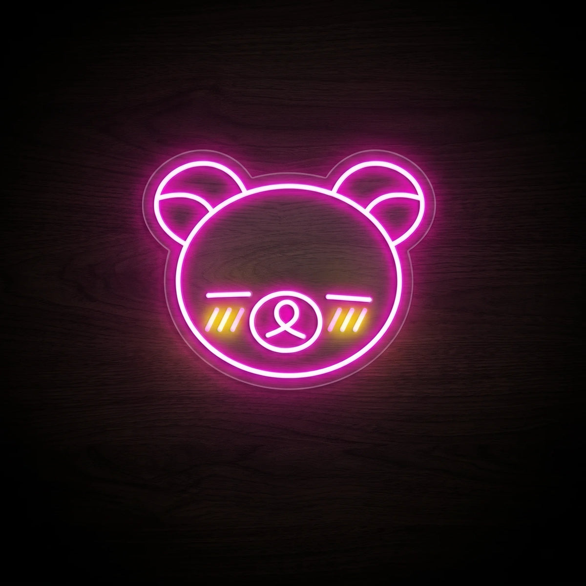 Kawaii Teddy Bear LED neon sign featuring a cute pink bear face with closed eyes and yellow blushing cheeks on clear acrylic.