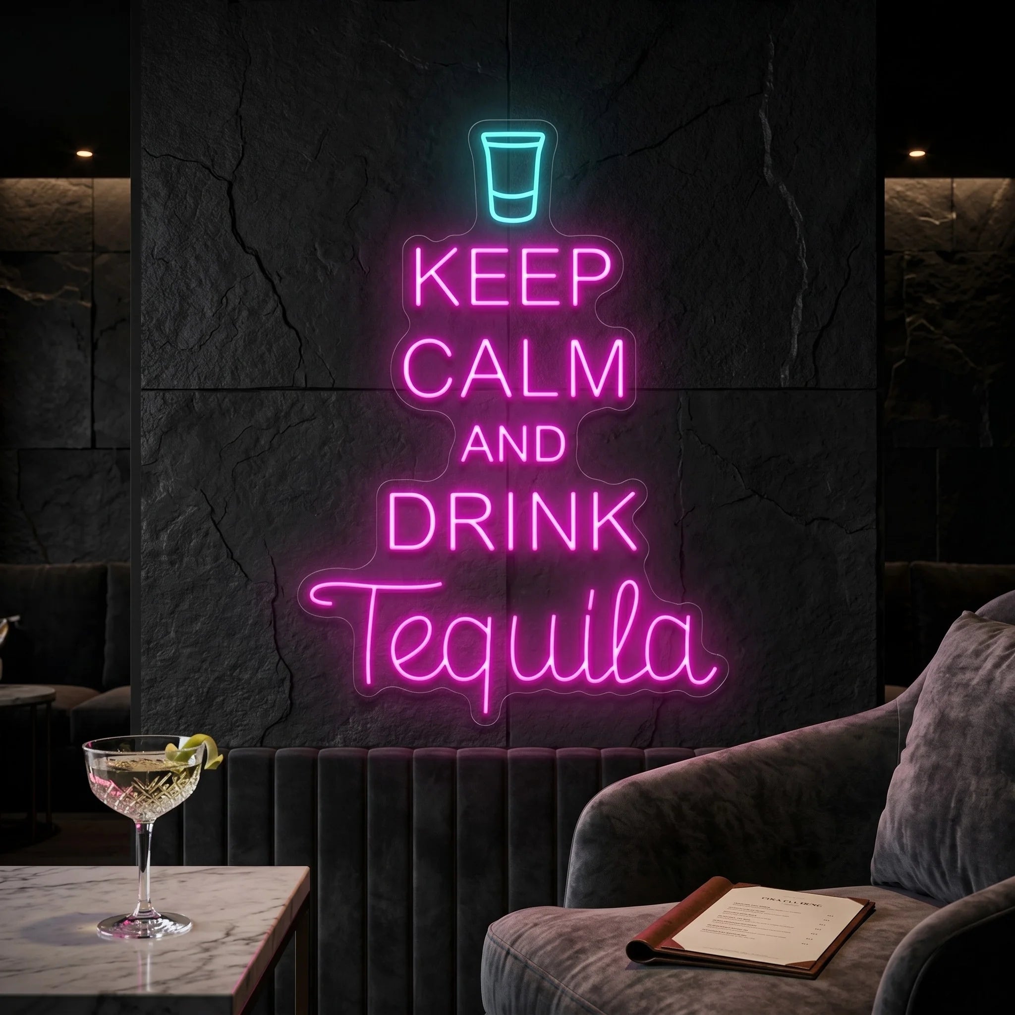 Photo of the 'Keep Calm and Drink Tequila' neon sign glowing in multi-color against a styled interior wall.