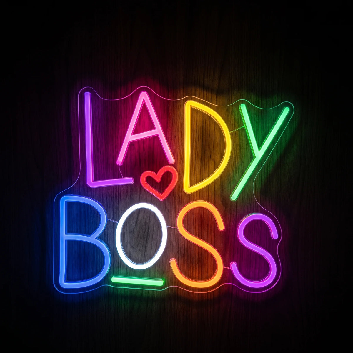Lady Boss LED neon sign featuring colorful multicolor lettering and a glowing heart design on clear acrylic backing.
