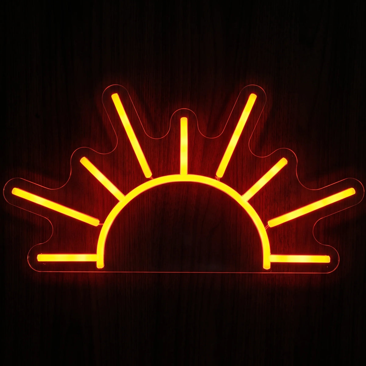 Minimal sunrise LED neon sign with bright orange-yellow illumination on clear acrylic backing.