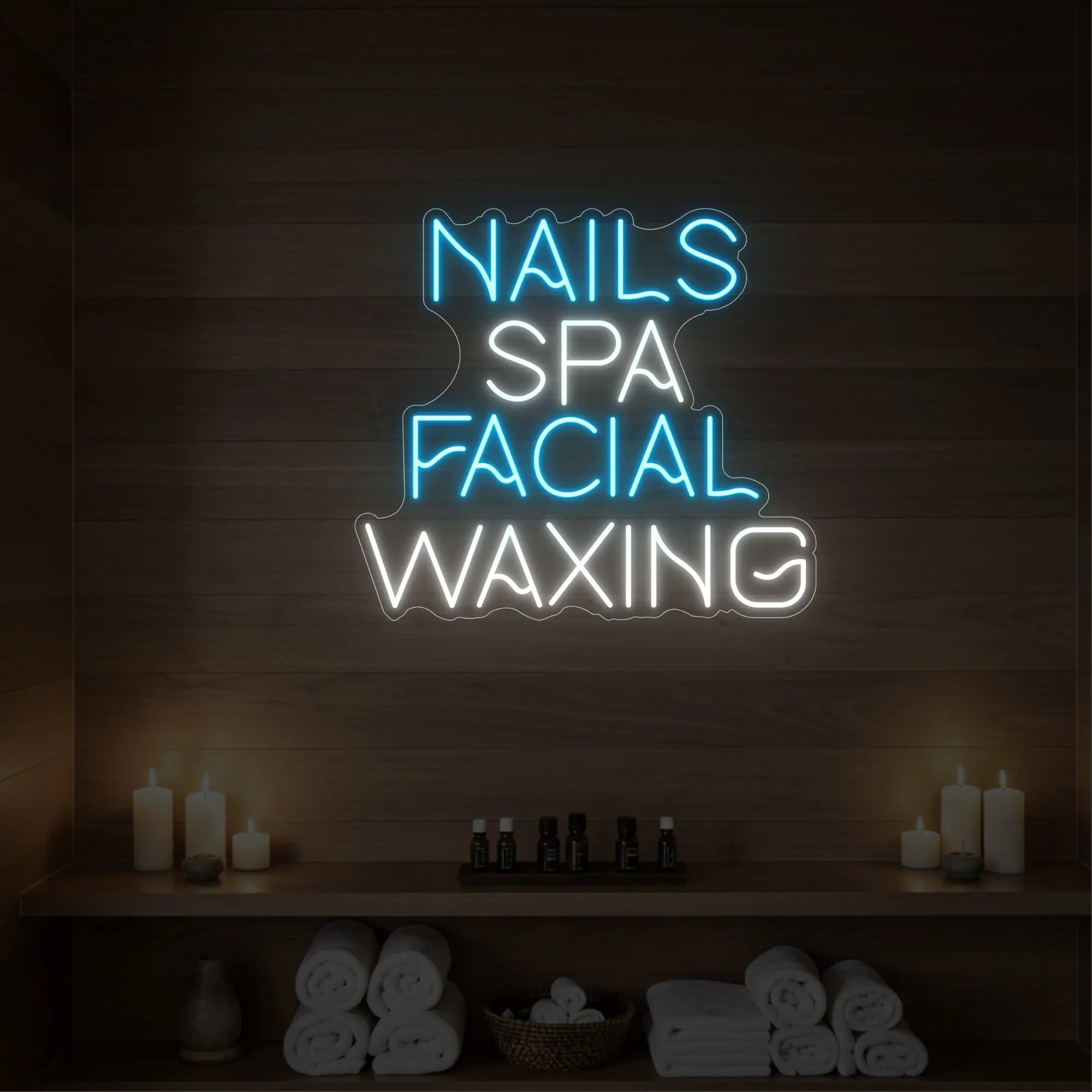 Photo of the 'Nails Spa Facial Waxing' neon sign glowing in ice blue against a styled interior wall.