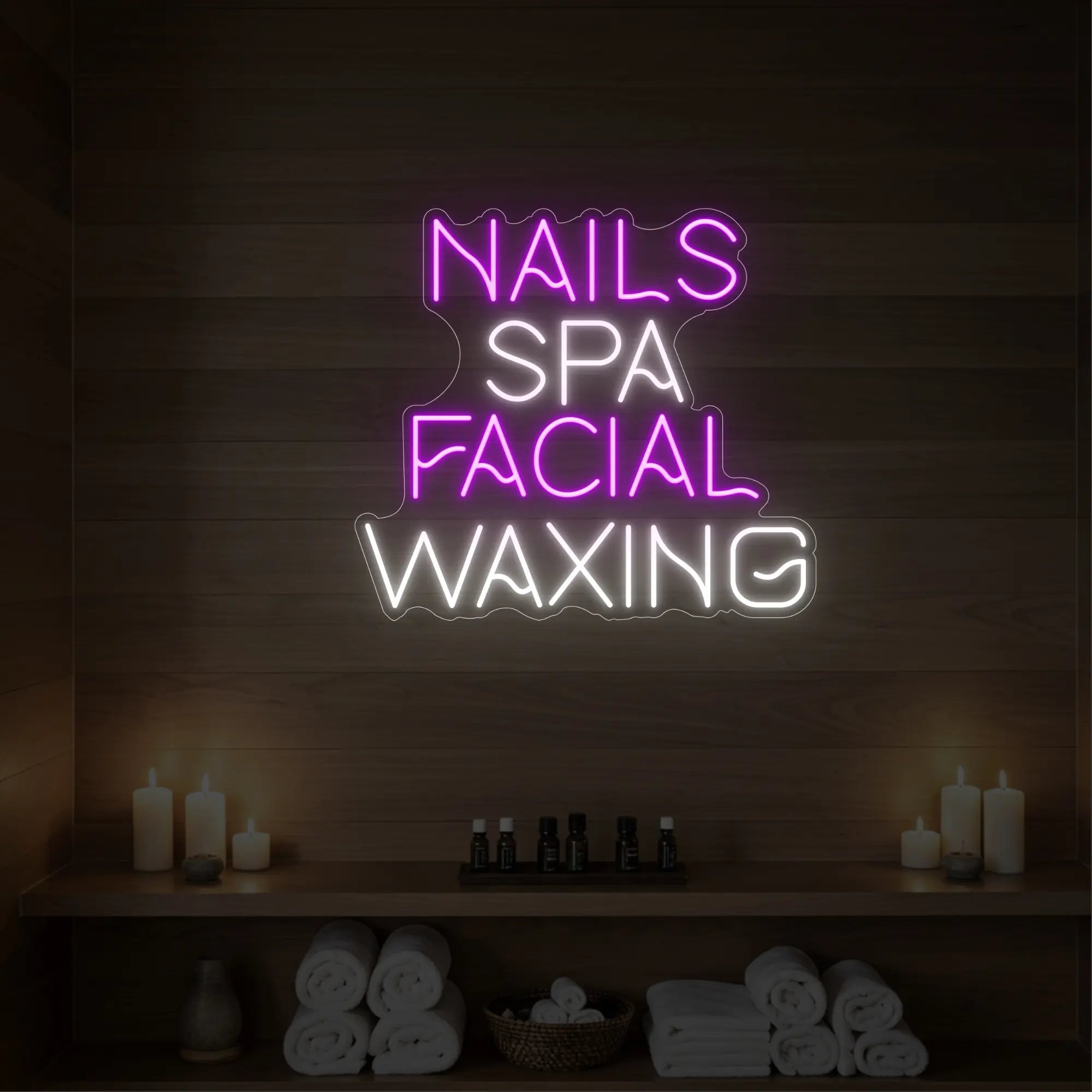 Photo of the 'Nails Spa Facial Waxing' neon sign glowing in deep pink against a styled interior wall.