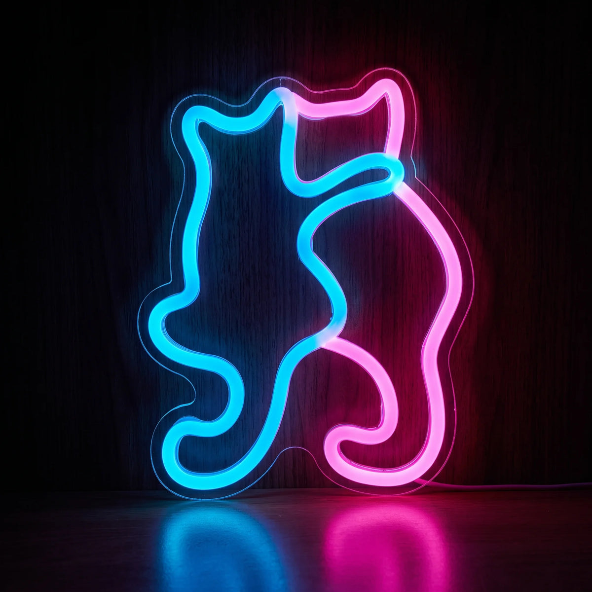 Pink Blue Cats LED Neon Sign featuring two sitting cat silhouettes in vibrant pink and blue neon on clear acrylic backing.
