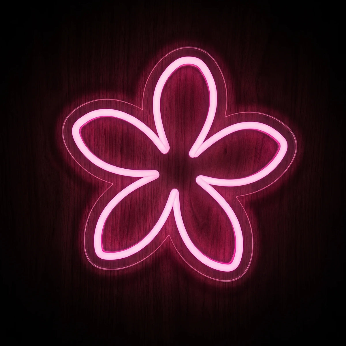 Plumeria Flower LED neon sign featuring a five-petal flower outline glowing in vibrant pink on clear acrylic backing.