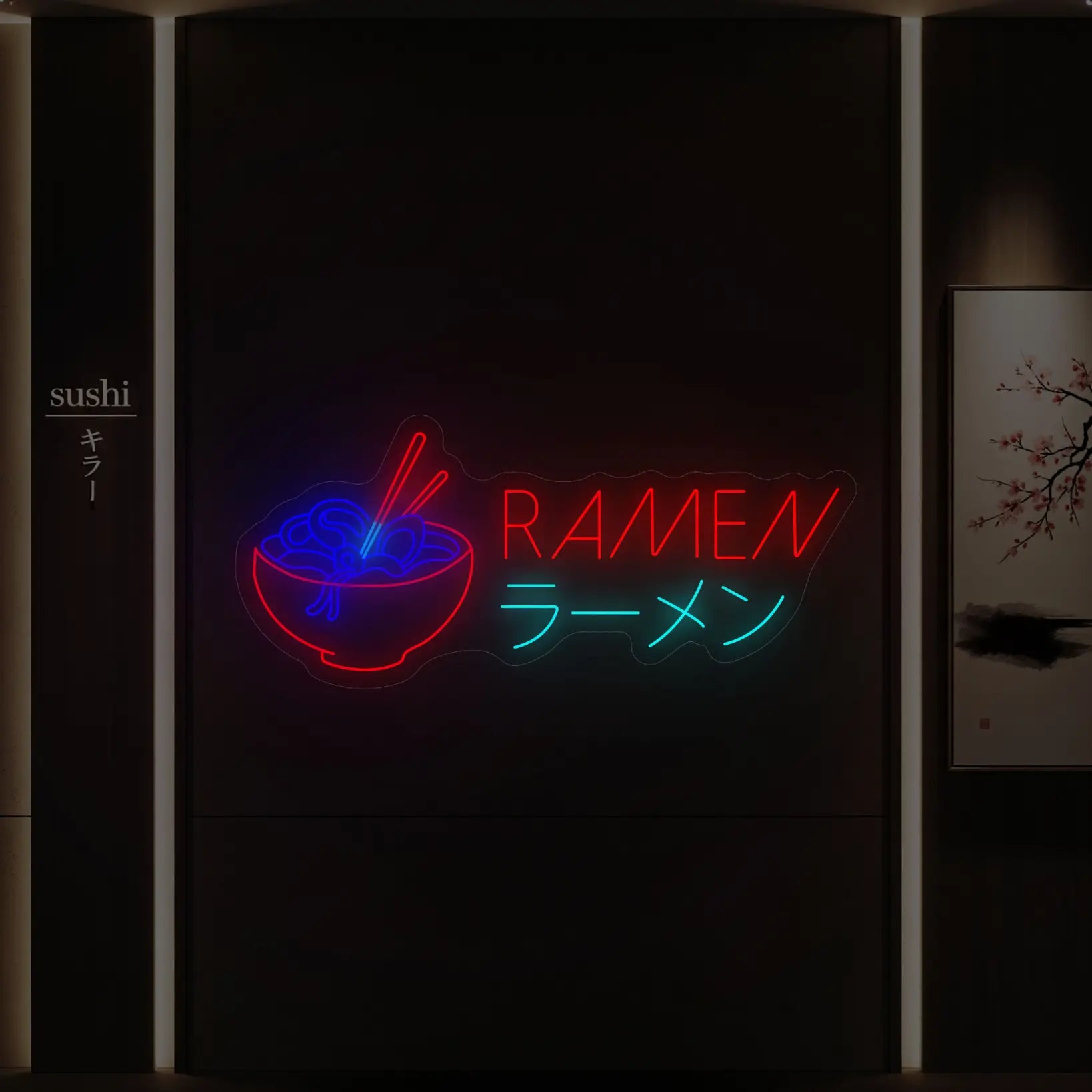 Photo of the 'RAMEN BOWL' neon sign glowing in multi-color against a styled interior wall.