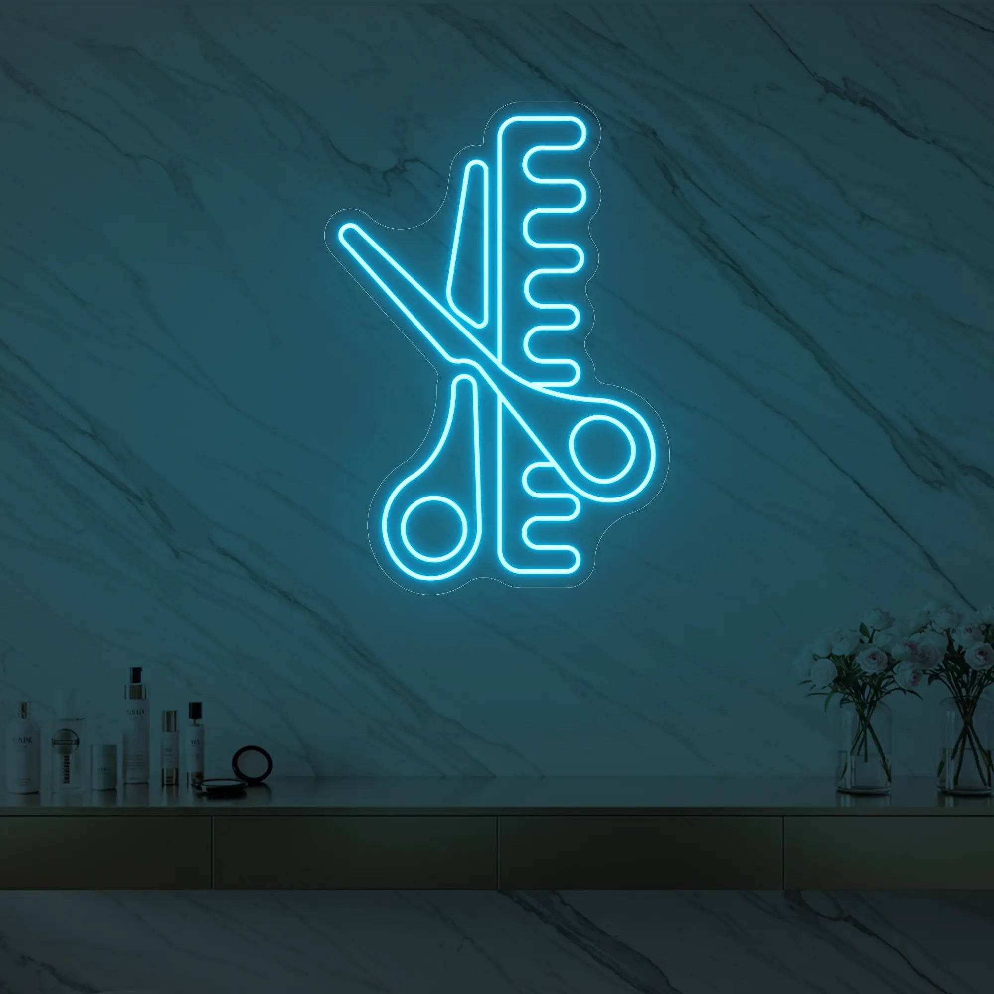 Photo of the 'Scissors and Comb' neon sign glowing in ice blue against a styled interior wall.