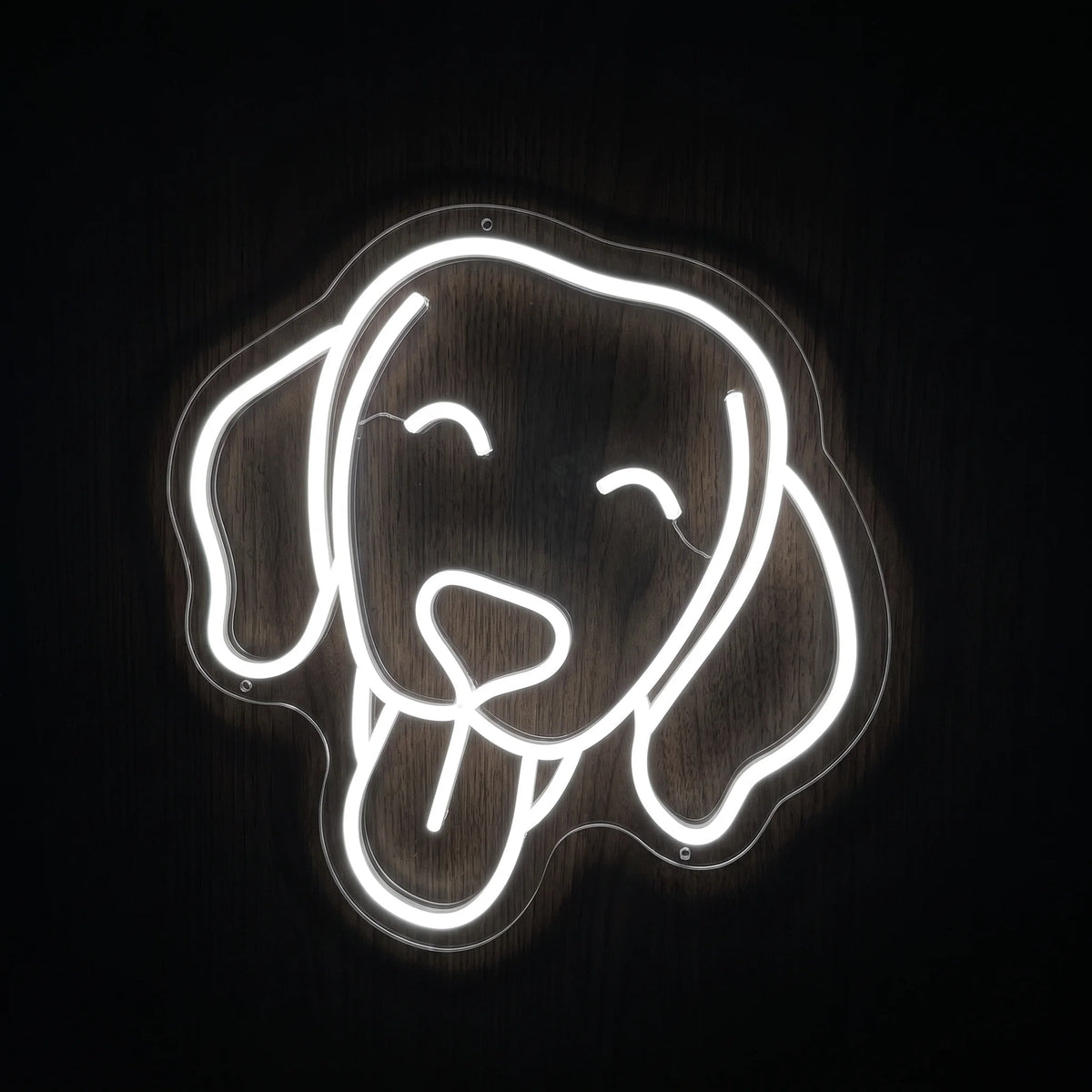 Sleepy Puppy LED Neon Sign featuring a cute white puppy face with floppy ears, closed eyes and a playful tongue on clear acrylic backing.