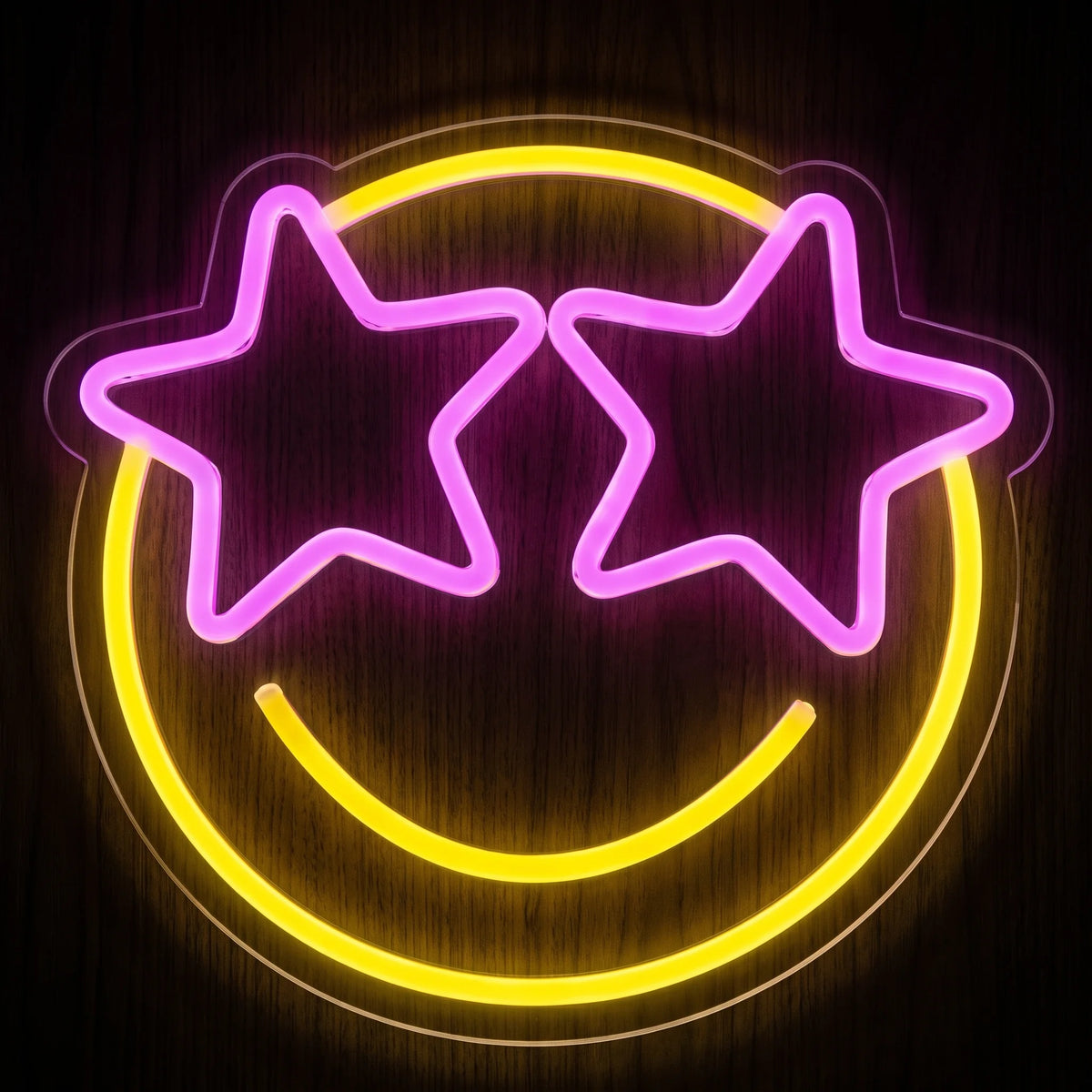 Star Eyes Smiley LED neon sign with pink star-shaped eyes and a bright yellow smiling face on clear acrylic backing.