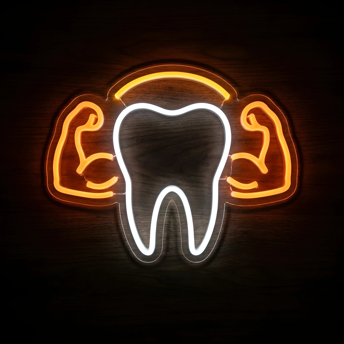 Strong Tooth Dental LED neon sign featuring a cool white tooth outline with orange flexing muscular arms and a golden-orange arch on clear acrylic backing for dental clinic wall decor.