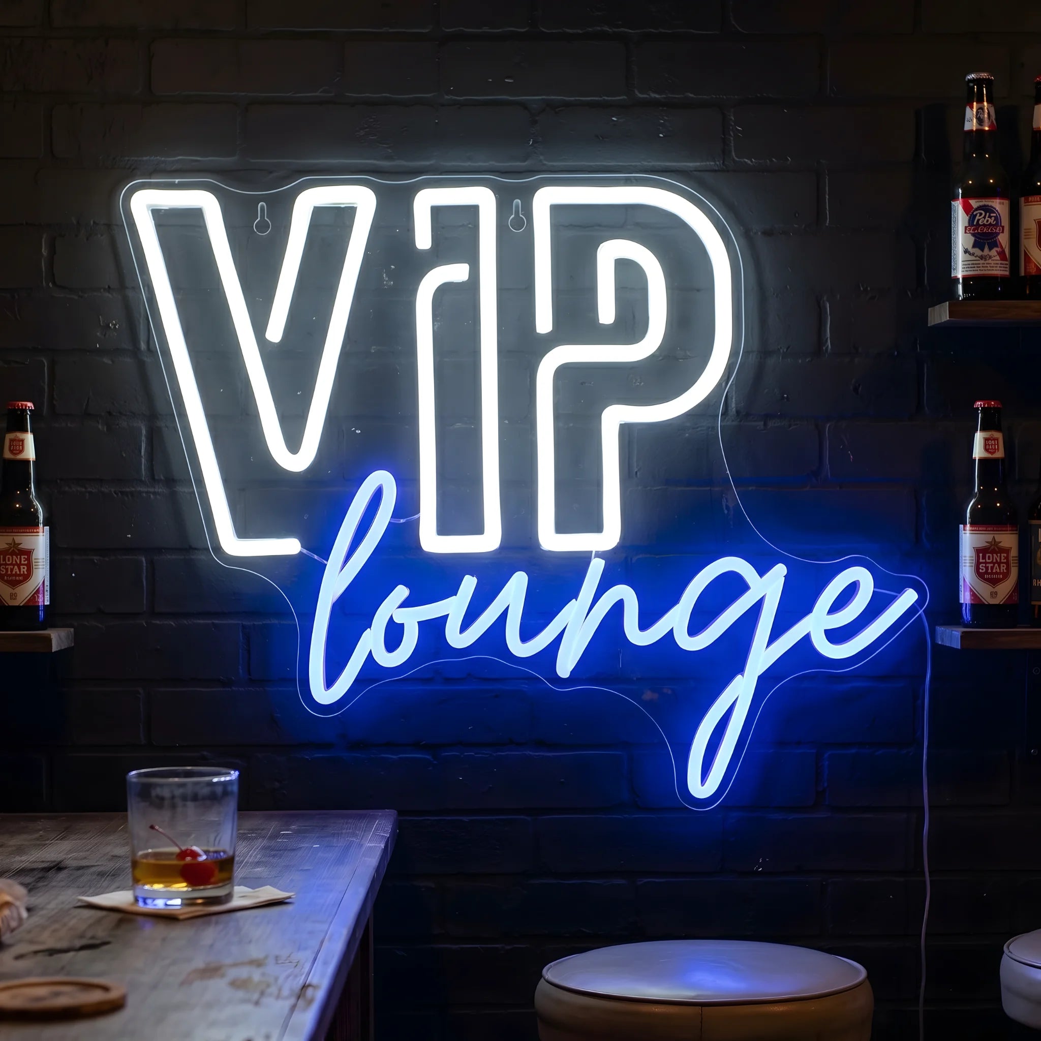 Photo of the 'VIP Lounge' neon sign glowing in multi-color against a luxury lounge-inspired wall.