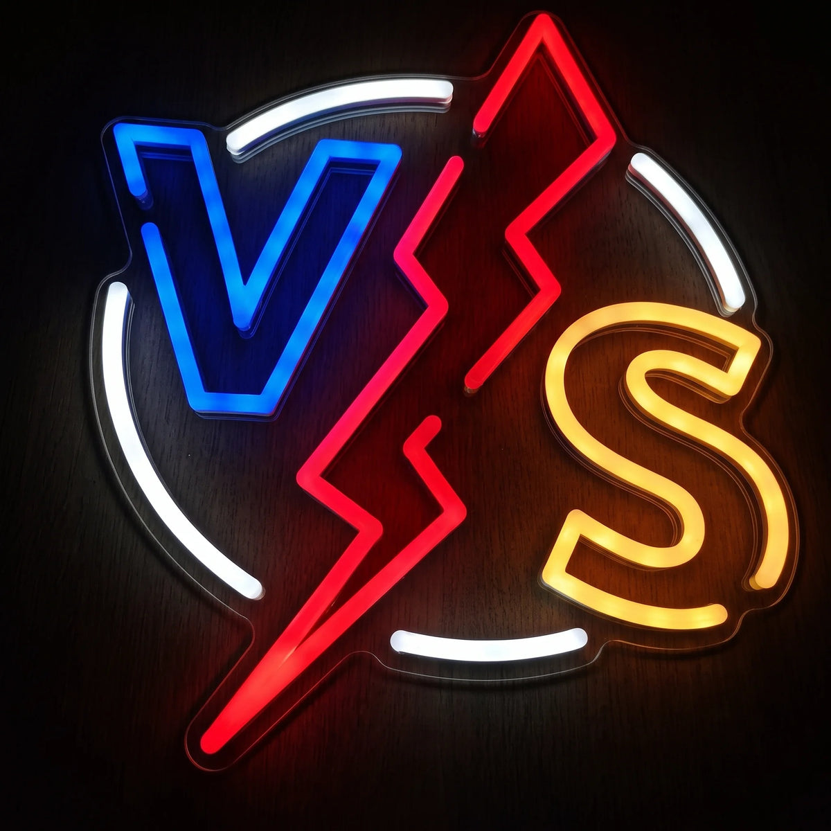 VS Lightning LED Neon Sign featuring blue and yellow-orange letters separated by a red lightning bolt with white accents.