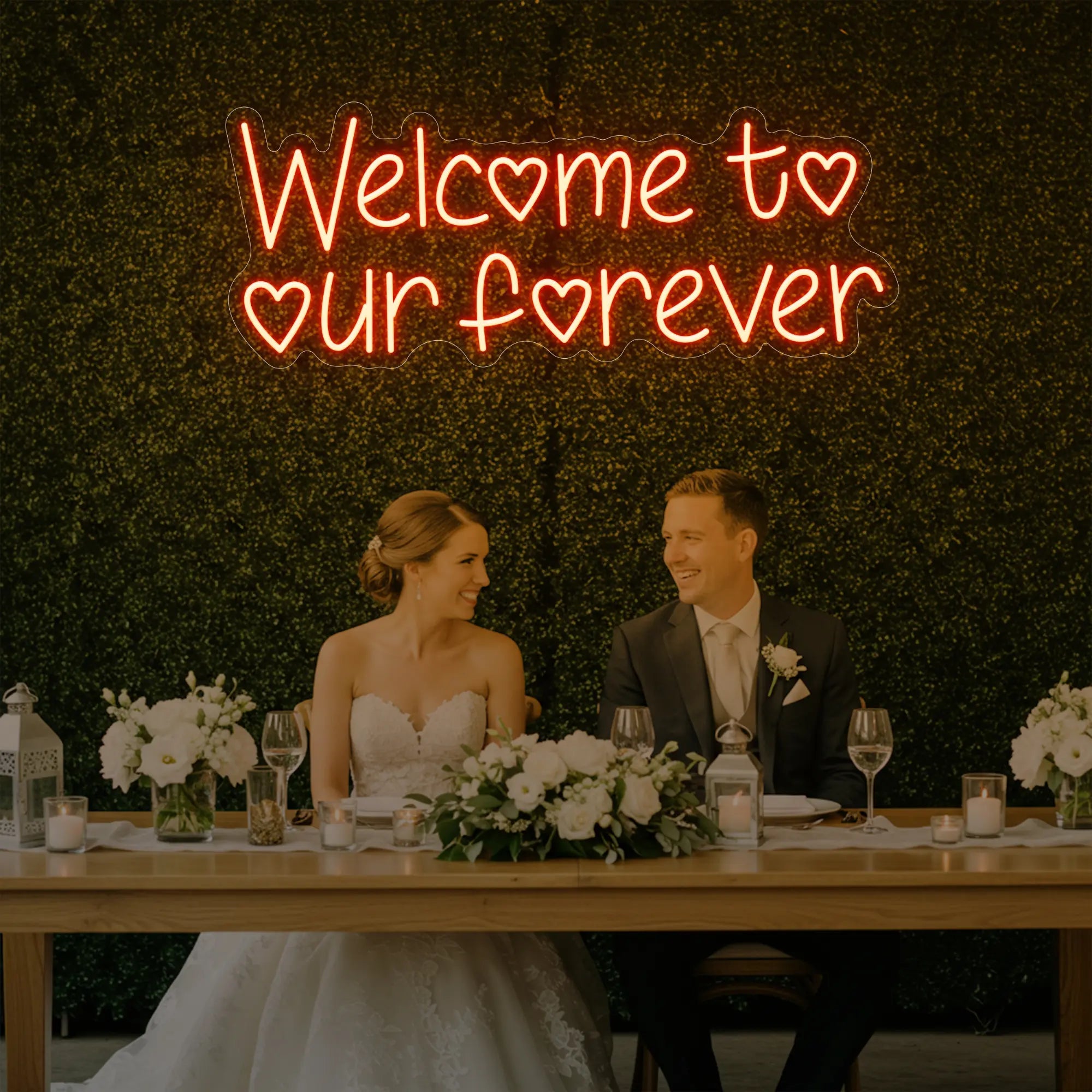 'Welcome To Our Forever' neon sign glowing in golden yellow against a styled interior wall.