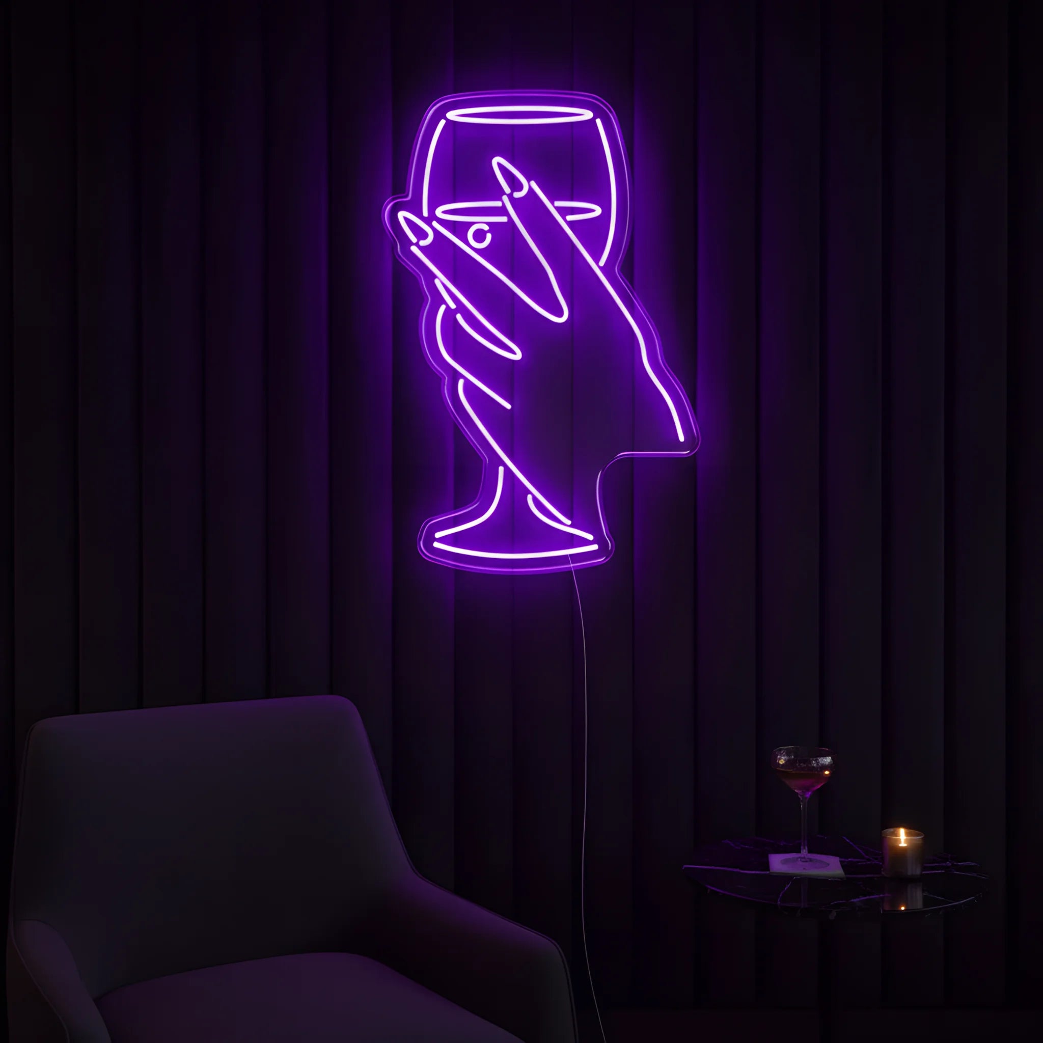 Photo of the 'Wine in Hand Version 1' neon sign glowing in purple against a cozy wine-inspired wall.