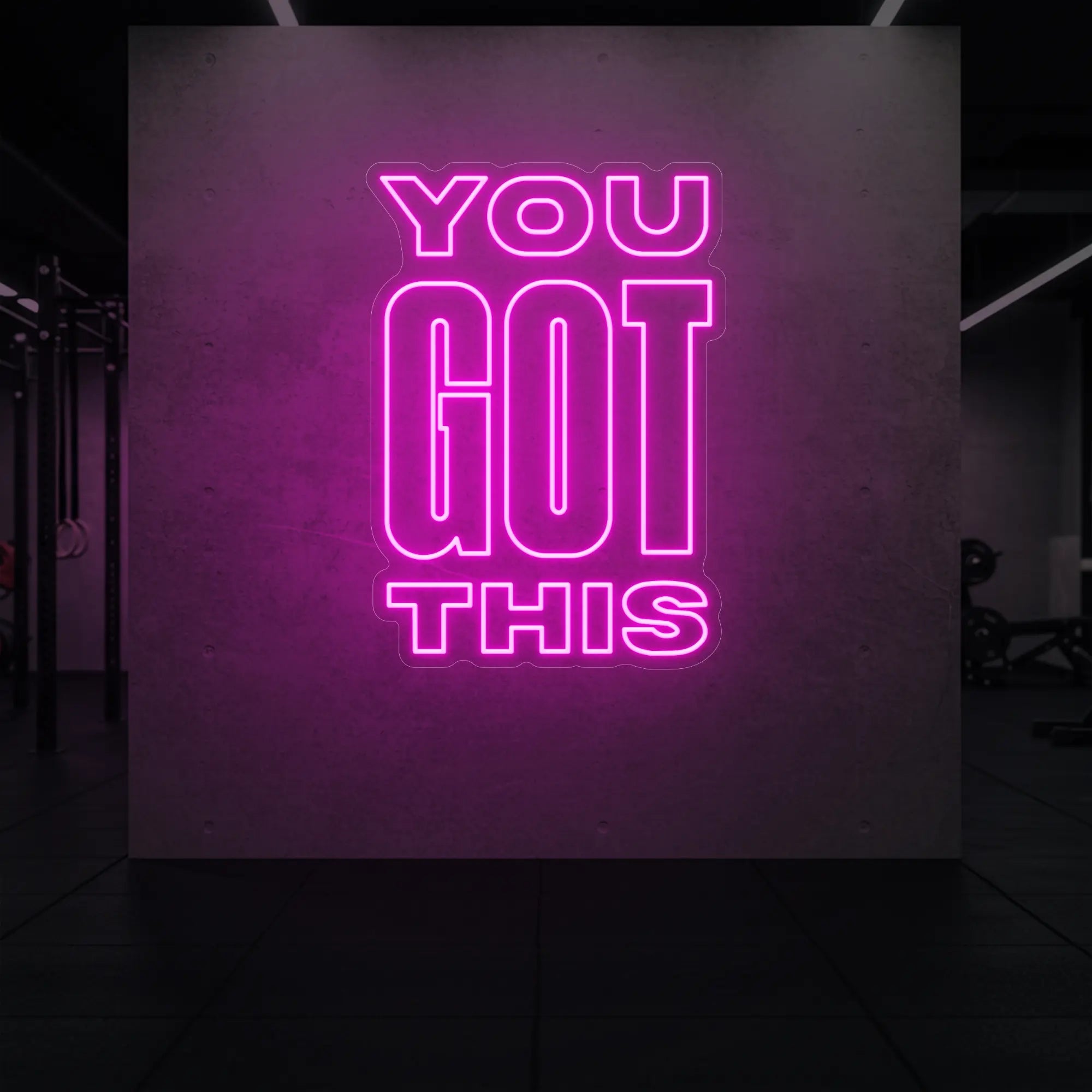 Photo of the 'YOU GOT THIS' neon sign glowing in light pink against a styled interior wall.