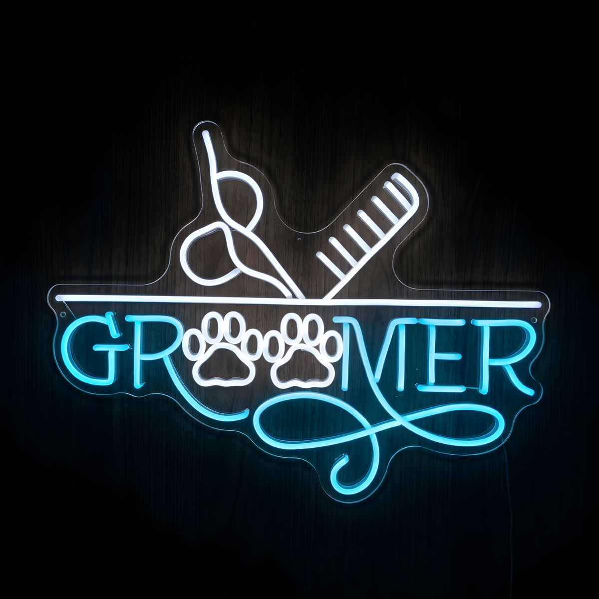 Groomer Essentials LED Neon Sign featuring glowing blue GROOMER lettering, white paw prints, grooming scissors and comb on clear acrylic backing, designed for pet grooming salons, professional dog groomers, pet spas, grooming studios, and animal care businesses
