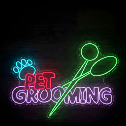 Pet Grooming Scissors LED Neon Sign featuring a bright blue paw print, pink PET lettering, purple GROOMING text, and oversized green grooming scissors on clear acrylic backing, ideal for dog grooming salons, pet spas, grooming studios, reception areas, and pet care business storefronts