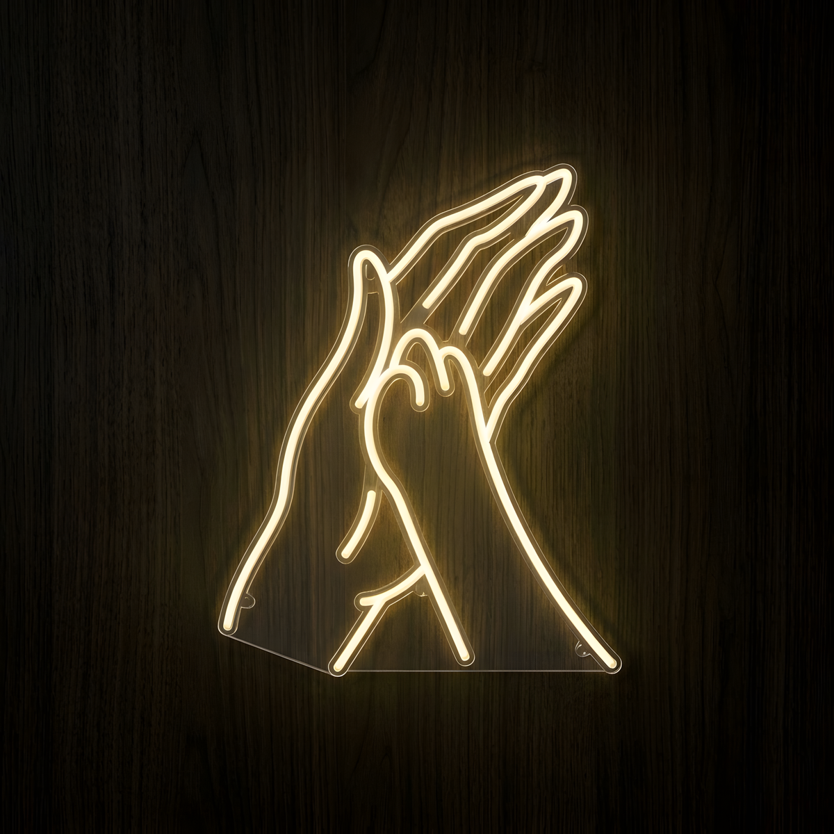 Pet High Five LED Neon Sign featuring warm white line art of a human hand giving a dog paw a high five, mounted on clear acrylic against a dark wood wall for pet store, veterinary clinic, grooming salon, or animal lover decor.