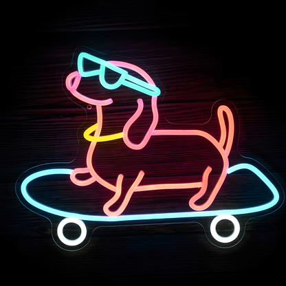 Skateboarding Dog LED Neon Sign featuring a playful pink neon dog wearing bright blue sunglasses and riding a blue skateboard with glowing white wheels on clear acrylic backing against a dark wood wall.