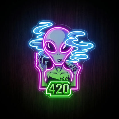 Alien 420 Cannabis LED neon sign featuring a smoking alien with colorful neon outlines above a glowing 420 emblem on a clear acrylic backing.