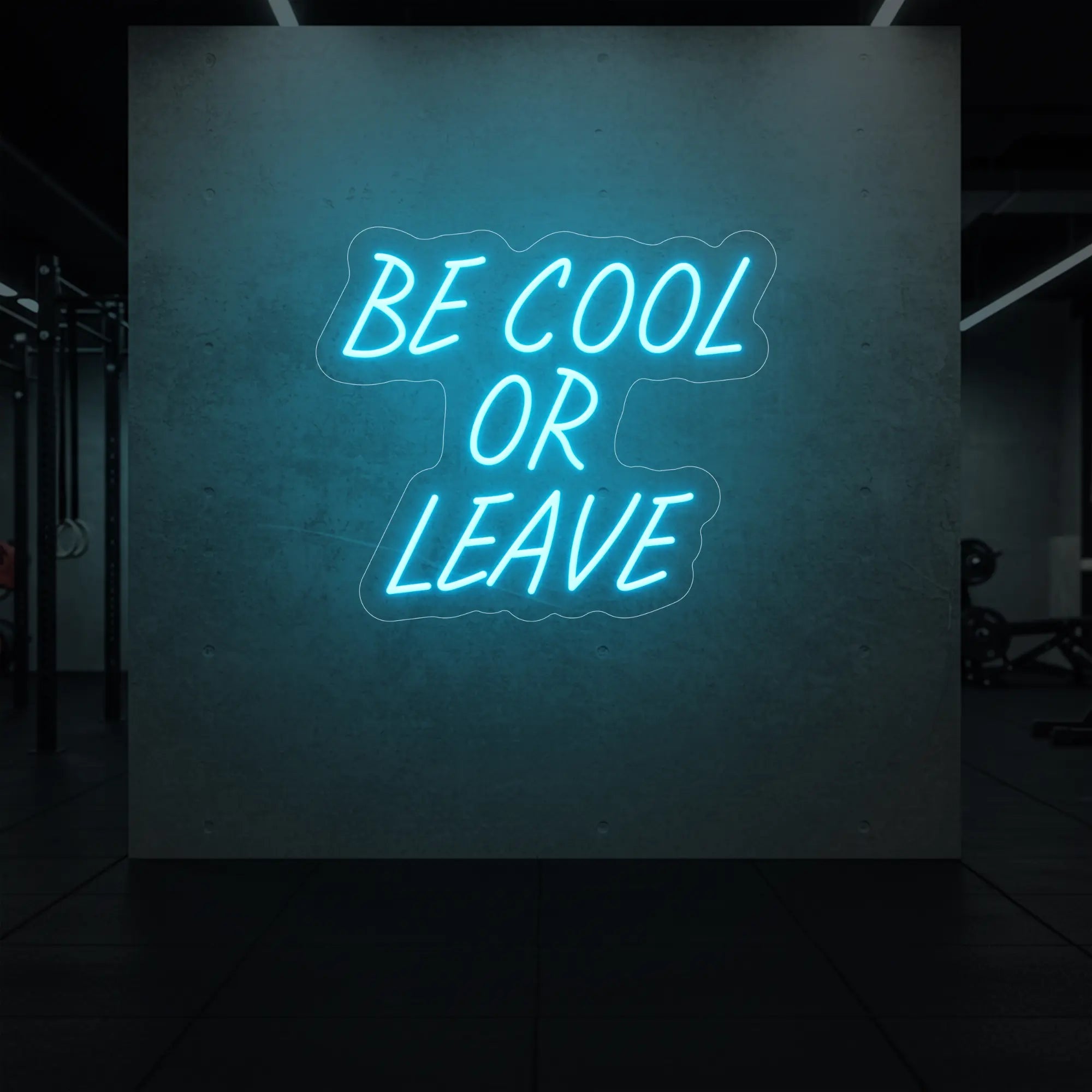'Be Cool or Leave' neon sign glowing in ice blue against a styled interior wall.