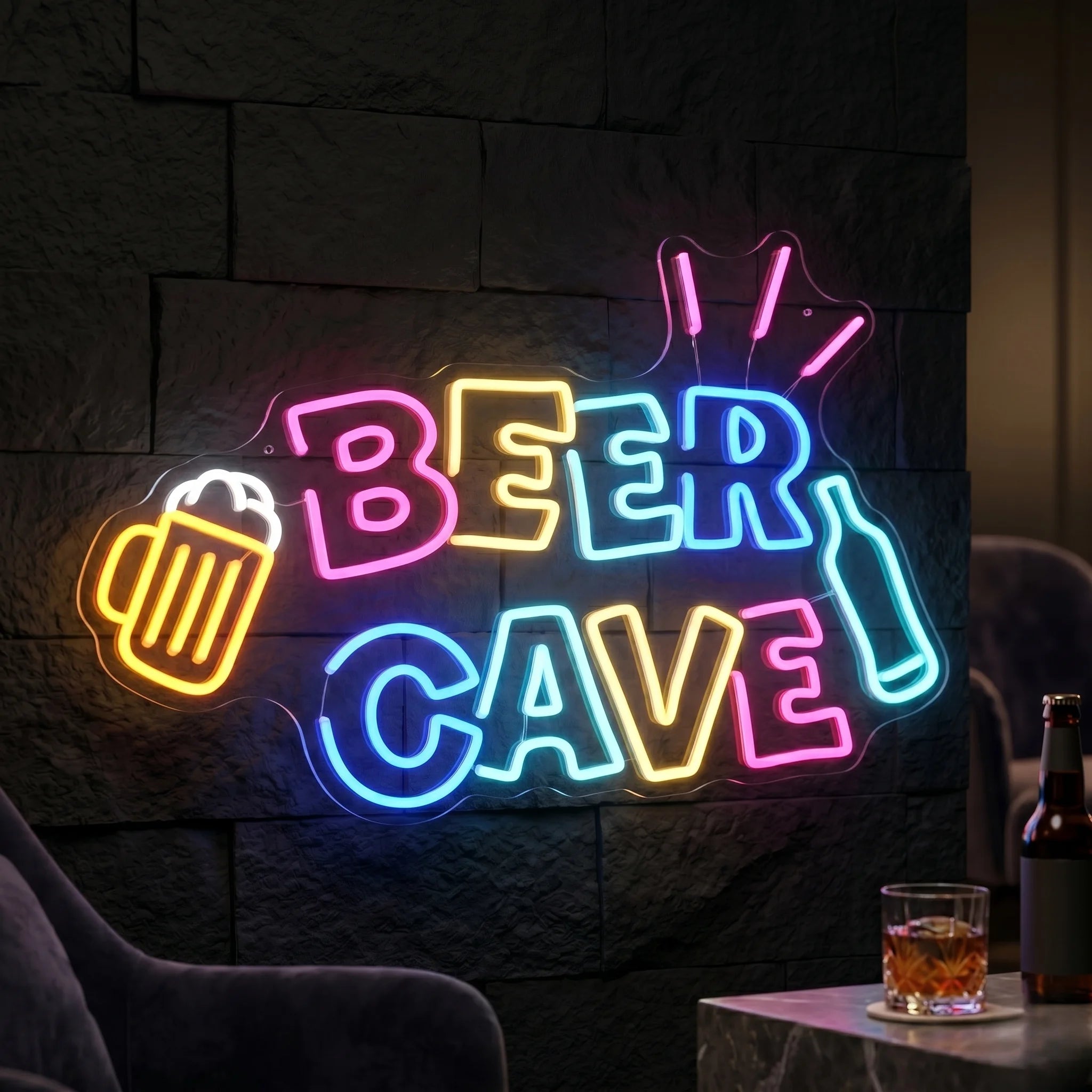 Photo of the 'BEER CAVE' neon sign glowing in multicolor against a styled interior wall.
