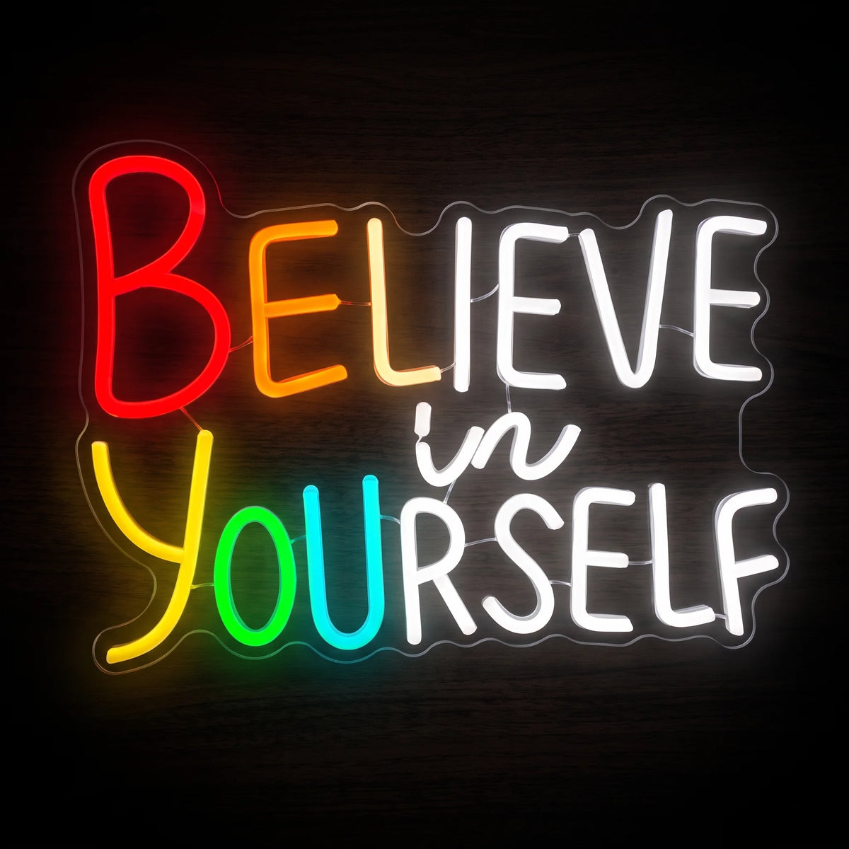 Believe in Yourself LED neon sign featuring colorful rainbow lettering and bright white motivational text.
