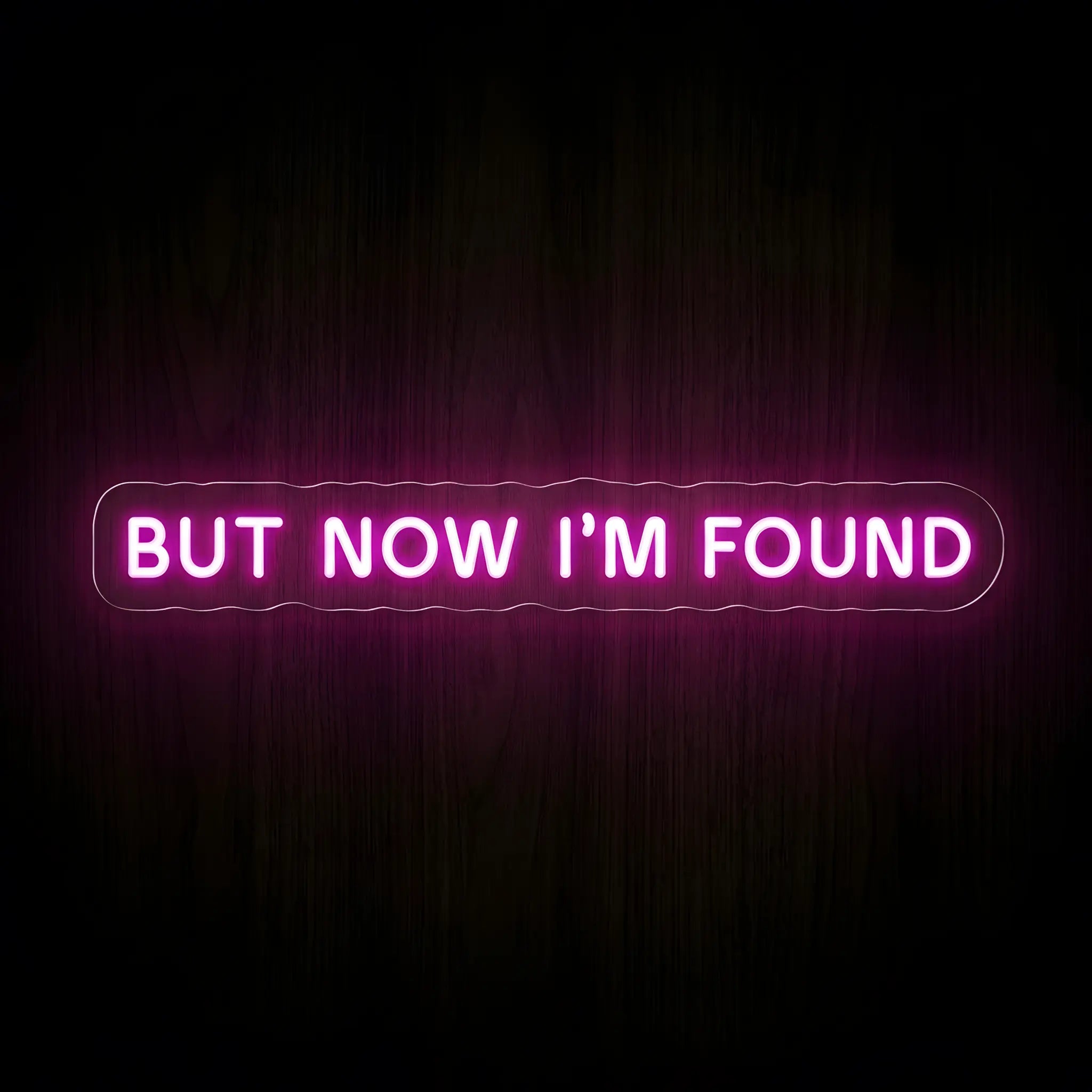 But Now I'm Found LED neon sign in vibrant pink with premium LED tubing on a precision-cut clear acrylic backing, inspired by the Amazing Grace hymn.
