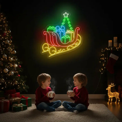 Photo of the 'Christmas Sleigh' neon sign glowing in multicolor against a styled interior wall.