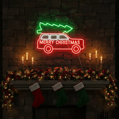 Photo of the 'Christmas Tree Shopping' neon sign glowing in multicolor against a styled interior wall.