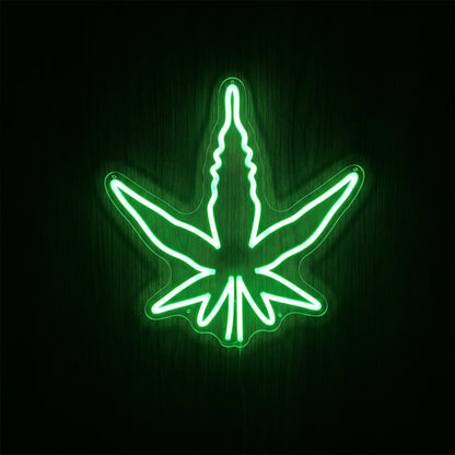 Classic green cannabis leaf LED neon sign on acrylic backing for cannabis wall décor, dispensary display, or adult recreational interiors.