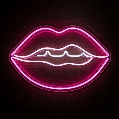 Classic Lips LED neon sign featuring a bright pink lip outline with white inner detail mounted on clear acrylic.
