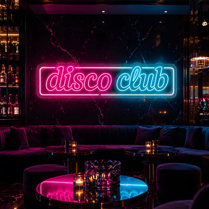 Photo of the 'DiscoClub' neon sign glowing in multi-color against a luxury nightclub-inspired wall.