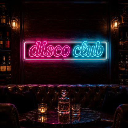 Photo of the 'DiscoClub' neon sign glowing in multi-color against a luxury nightclub-inspired wall.
