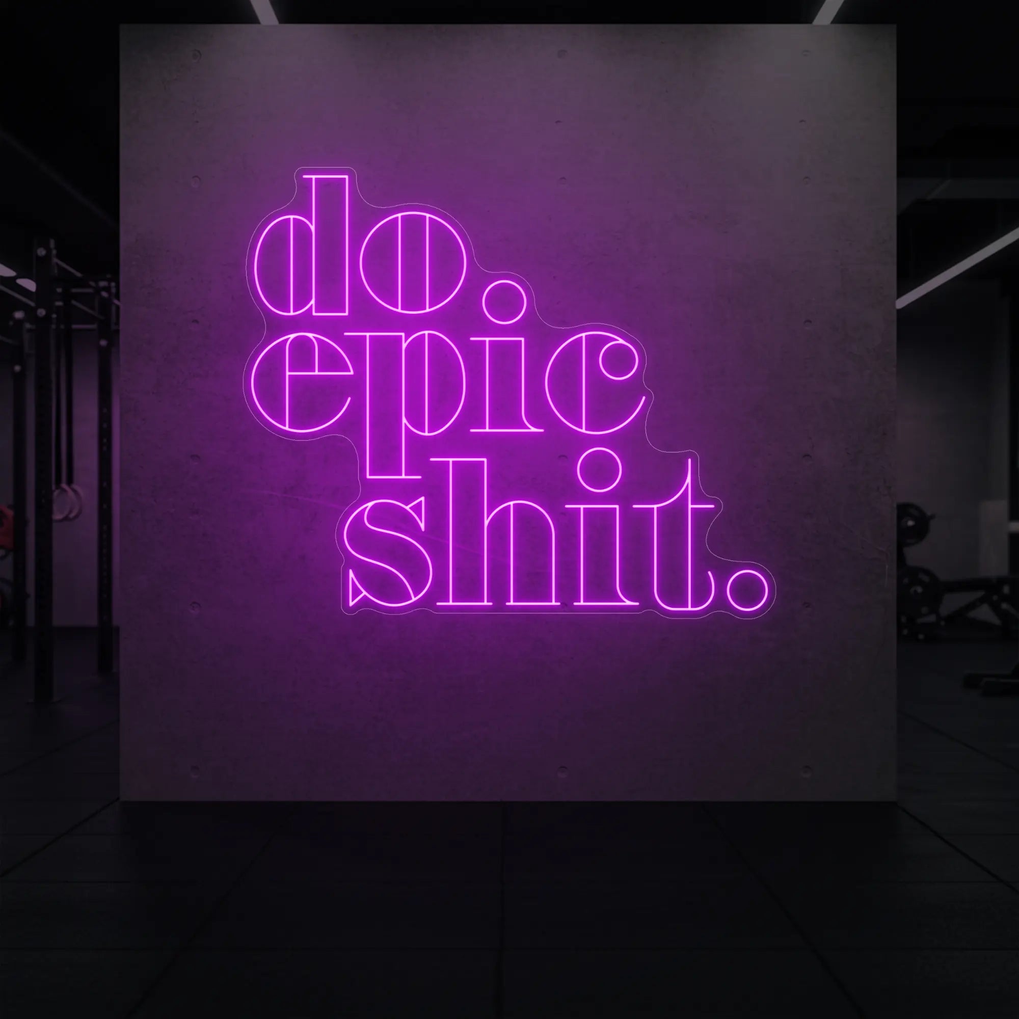 'Do Epic Shit.' neon sign glowing in deep pink against a styled interior wall.