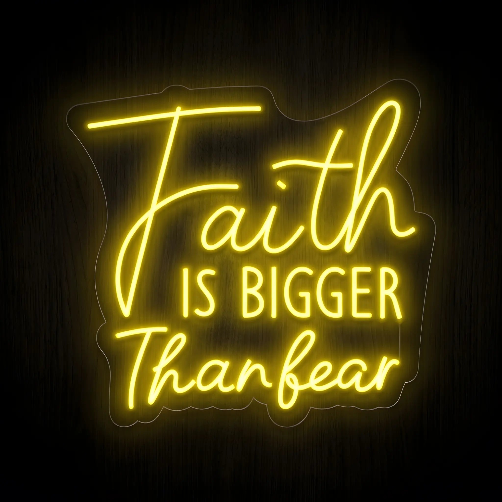 Faith Is Bigger Than Fear LED neon sign on precision-cut acrylic backing with warm golden yellow illumination for Christian wall decor.