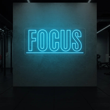  'Fortune Favours the Brave' neon sign glowing in ice blue against a styled interior wall.