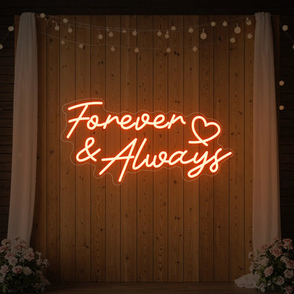Photo of the 'Forever & Always' neon sign glowing in golden yellow against a styled interior wall.