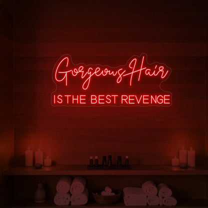 Photo of the 'Gorgeous Hair is the Best Revenge' neon sign glowing in red against a styled interior wall.